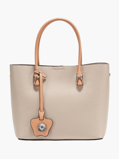 Kelly | Classic Black Leather Tote with Tan Handles and Decorative Charm